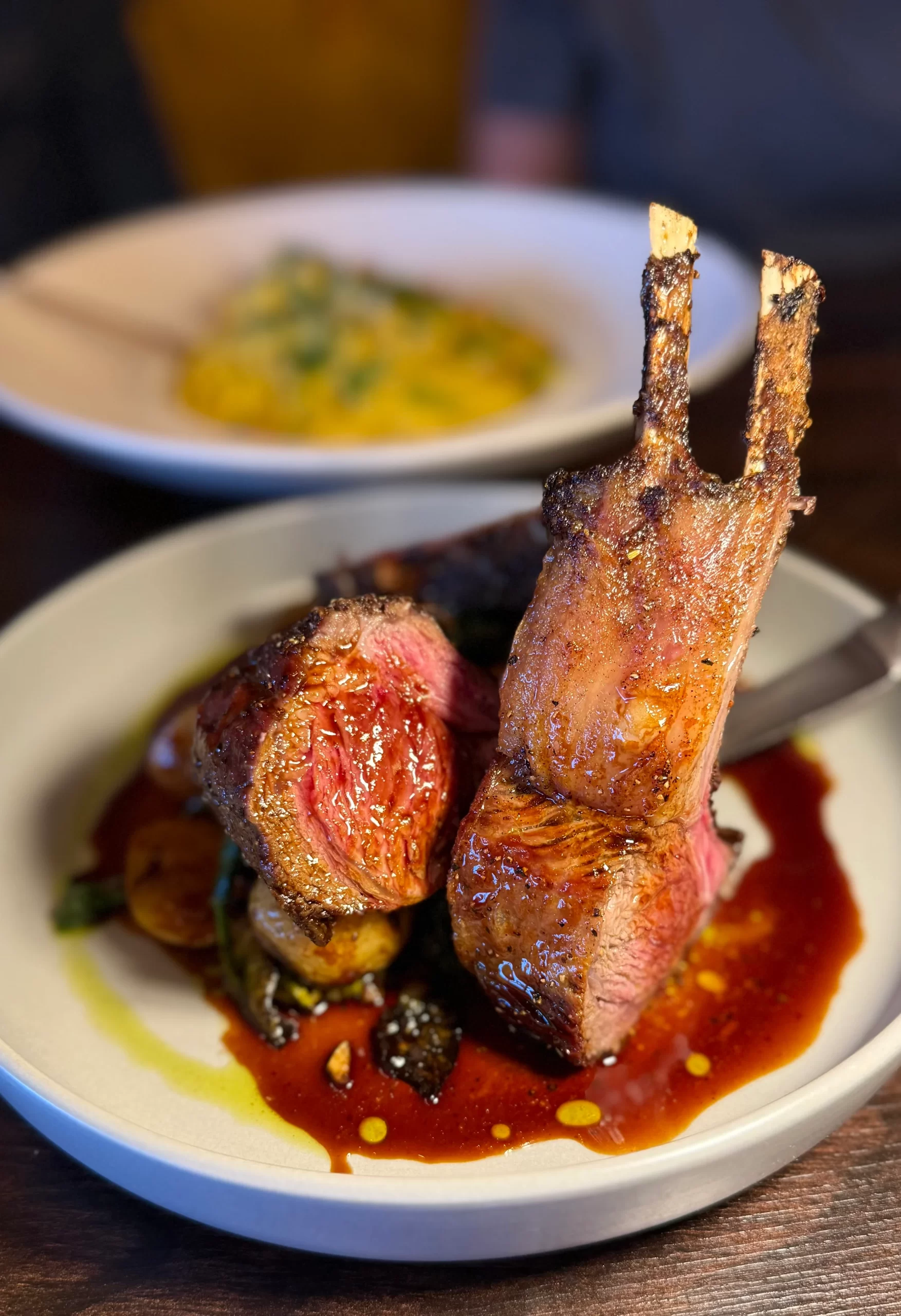 Pan-Seared Rack of Lamb Pan-seared rack of lamb with lamb demi-glace at JC Bruno Restaurant in San Bruno, CA